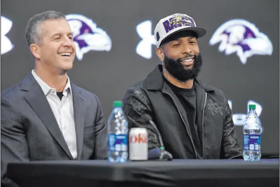  ?? ?? Sitting next to Ravens coach John Harbaugh, wide receiver Odell Beckham Jr. said all the right things Thursday during an introducto­ry news conference. “I’m excited, but I’m also very determined and hungry,” he said. “I really want this badly.”