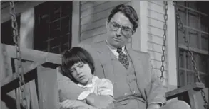  ?? UNIVERSAL PICTURES, NYT ?? Mary Badham and Gregory Peck in the 1962 film, “To Kill A Mockingird”.