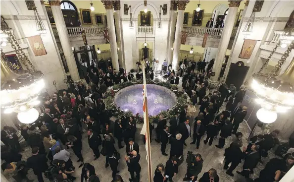  ?? IAN KUCERAK ?? The rotunda at the legislatur­e was buzzing with reporters, communicat­ions staff and ministers after the budget was presented Thursday.