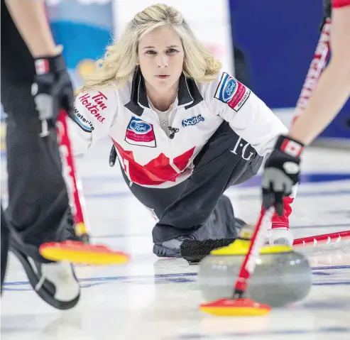  ?? PAUL CHIASSON / THE CANADIAN PRESS ?? Canada skip Jennifer Jones watches her shot as her team faces Russia on Thursday.