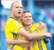  ?? AP ?? Sweden captain Andreas Granqvist (left) is greeted by Marcus Berg after he scored from the penalty against South Korea.