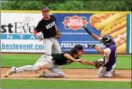  ?? AUSTIN HERTZOG - DIGITAL FIRST MEDIA ?? Boyertown’s Mitch Pinder tags out Plum’s Justin Sembower on a stolen base attempt.