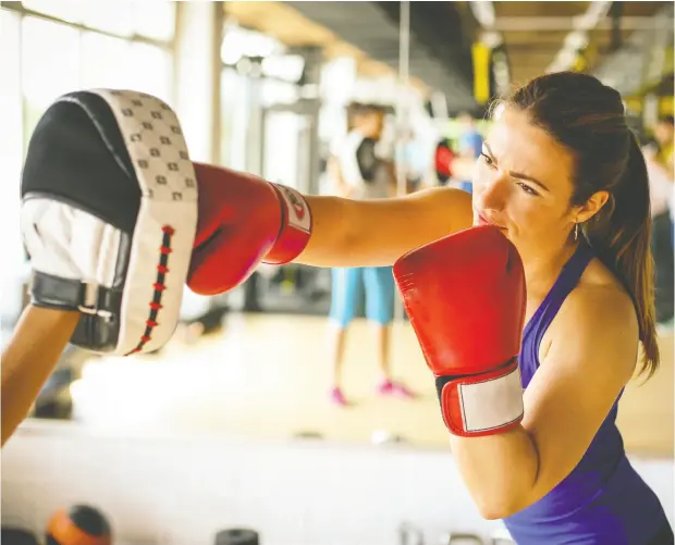  ?? Photos: Getty
Images ?? An intense boxing workout has myriad benefits, including core strengthen­ing, stress management and the ability to torch plenty of calories.