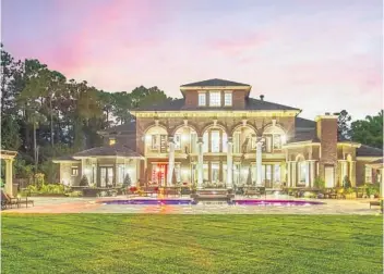  ?? COURTESY ?? The most expensive home sale in 2021, this estate on Lake Mabel in southwest Orange County sold for $12.5 million.