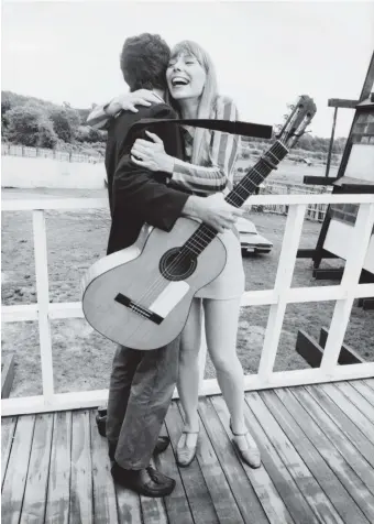  ??  ?? Joni Mitchell and Leonard Cohen at the Newport Folk Festival, July 1967