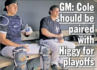  ?? N.Y. Post: Charles Wenzelberg ?? A GOOD FIT: General manager Brian Cashman said if teaming backup catcher Kyle Higashioka (left) with Gerrit Cole in the postseason gives the Yankees their best chance of winning “that is something we should do.”