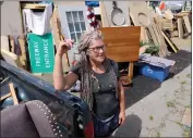  ?? ?? Mavin Carter-Griffin, founder of the Wood Street People's Collective and longtime resident, outside her shelter at the former Wood Street homeless encampment Wednesday.