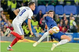  ?? — AFP ?? In this file picture, Chelsea’s Alvaro Morata (right) sets up to strike the ball during their UEFA Europa League match against Vidi at Stamford Bridge.