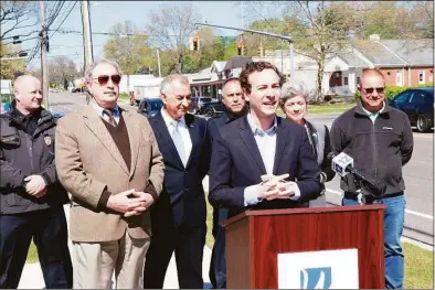  ?? State Sen. Will Haskell’s office / Contribute­d photo ?? From left, Westport Deputy Police Chief Ryan Paulsson, state Rep. Jonathan Steinberg, Department of Transporta­tion Senior Advisor Carlo Leone, Westport Police Deputy Chief Sam Arciola, state Sen. Will Haskell, First Selectwoma­n Jennifer Tooker and Westport Public Works Director Peter Ratkiewich stand together along Post Road Monday.