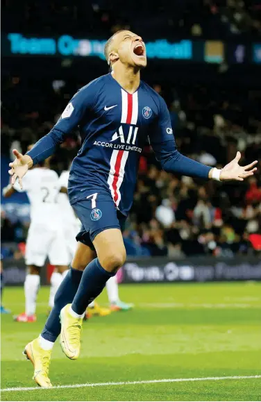  ?? Reuters ?? Paris St Germain’s Kylian Mbappe celebrates after scoring a goal during their French League match on Saturday.