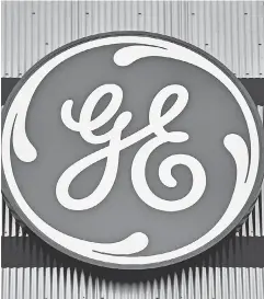  ?? LOIC VENANCE, AFP/ GETTY IMAGES ?? General Electric is offering pension buyouts.