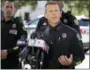  ?? JOHN RAOUX - THE AP ?? Orlando Police Chief John Mina answers questions at an afternoon news conference during a hostage standoff Monday, in Orlando, Fla. Police said a man suspected of battering his girlfriend shot a police officer late Sunday and barricaded himself inside...