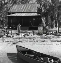  ??  ?? Vintage photos of the historic Woodring Home are part of the Woodring10­0thAnniver­sary exhibition at the J.N. “Ding” Darling National Wildlife Refuge, Jan. 23-March 25.