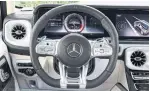  ??  ?? The AMG G63 is loaded up with digital wizardry such as adaptive cruise control and lane-keeping assist.