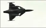  ??  ?? An SAAF fighter jet roars past during the celebratio­ns.