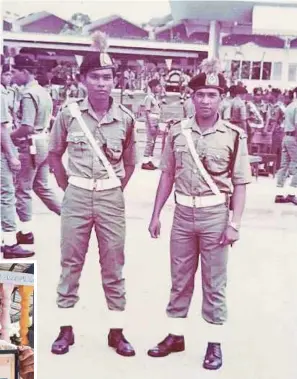  ?? PIX BY MOHAMMAD ISHAK ?? Shaari Abu Bakar (right) and his colleague during a threemonth basic training course in Kuala Lumpur. (Inset) Shaari, 67, showing a certificat­e of appreciati­on from the then inspector-general of police Tan Sri Abdul Rahim Noor in 1995.