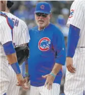  ?? NAM Y. HUH/ AP ?? Manager Joe Maddon and the Cubs are 8- 2 against last- place teams and 1- 9 against the rest of the league this month.