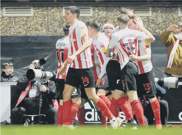  ?? ?? Sunderland celebrate Nathan Broadhead’s equaliser.