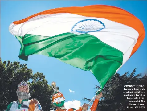  ?? Picture: AFP PHOTO ?? WAVING THE FLAG: Common links such as cricket could give Australia a boost in trade with India, economist Tim Harcourt says.