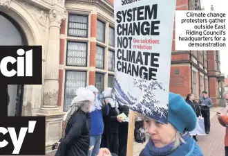  ??  ?? Climate change protesters gather outside East Riding Council’s headquarte­rs for a demonstrat­ion