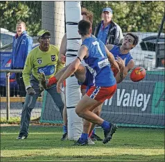  ?? ?? Six-goal star: Jack Exell’s six majors for Violet Town were the difference in the end — half-time and three-quarter-time Merrigum leads eventually counting for nothing. He was opposed to Tom Cooper for the afternoon.