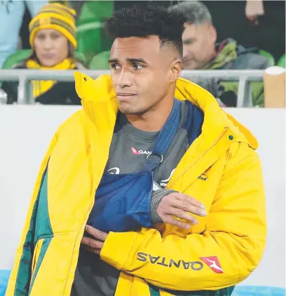  ?? SEASON OVER: Wallabies star Will Genia broke his arm in Saturday’s loss to Ireland. ??