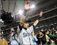  ?? AP/TORU TAKAHASHI ?? Seattle Mariners right fielder Ichiro Suzuki waves to fans after returning to the field after Thursday’s game against the Oakland Athletics at Tokyo Dome. The 45-year-old Mariners star announced his retirement after 19 seasons.
