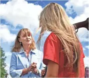  ?? LARRY THE TENNESSEAN ?? House Speaker Beth Harwell talks with Hannah Chandler during a campaign appearance at Nashville Gun Club during the Scholastic Clay Target Program competitio­n June 21. MCCORMACK /