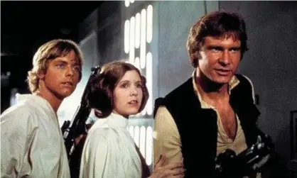  ??  ?? Mark Hamill, Carrie Fisher and Harrison Ford in Star Wars: A New Hope. Alan Dean Foster wrote an official novelisati­on of the 1977 film in 1976. Photograph: AP