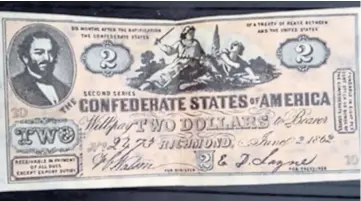  ?? ?? Donald Abbott raided his home safe for this authentic two-dollar Confederat­e States of America bank note issued in Confederac­y capital Richmond, Virginia, in 1862. See right.