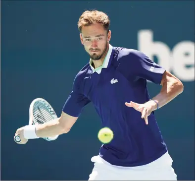  ?? Wilfredo Lee / Associated Press ?? Daniil Medvedev returns a shot from Andy Murray during the Miami Open on Saturday.