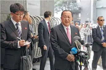  ?? Richard Drew / Associated Press ?? North Korean Foreign Minister Ri Yong Ho, center, says his country has every right to defend itself.