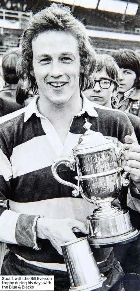  ??  ?? Stuart with the Bill Everson trophy during his days with the Blue & Blacks