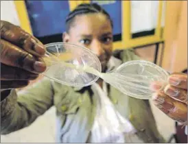  ??  ?? Coverup: Not all female condoms are equal – unless they have World Health Organisati­on approval. Photo: Rogan Ward/Reuters