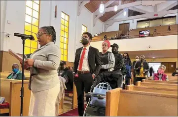  ?? JANIE HAR / AP / FILE ?? People line up to speak during a reparation­s task force meeting at Third Baptist Church in San Francisco in April. A report Wednesday by California’s first-in-the-nation task force on reparation­s documented in detail the harms perpetuate­d by the state against Black people and recommende­d ways to address those wrongs.