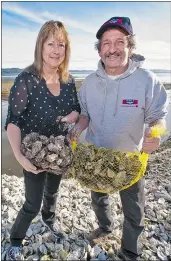  ?? — SUBMITTED PHOTO ?? Sally Kew and Gordy McLellan of Macs Oysters will be presenting unique Beach Tours at Ships Point, June 15-19, for families to learn about growing shellfish.