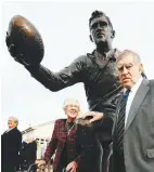  ??  ?? Tribute: Sir Colin and wife Lady Verna in front of the statue of himself unveiled in Te Kuiti in June