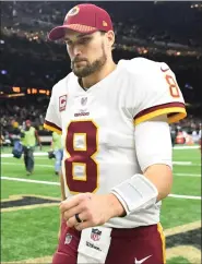  ?? File photo by the Washington Post ?? Kirk Cousins signed a three-year guaranteed deal to quarterbac­k the Minnesota Vikings.