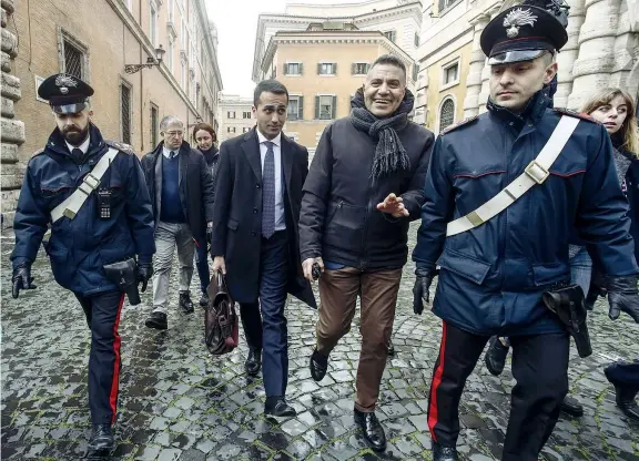  ?? (Ansa) ?? Scortato Roma, Luigi Di Maio, 31 anni, lascia il Senato al termine della riunione con il nuovo gruppo del Movimento Cinque Stelle a Palazzo Madama