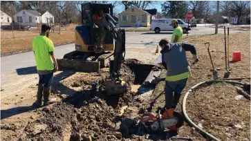  ?? (Pine Bluff Commercial/Byron Tate) ?? The Arkansas Public Service Commission and the state attorney general’s office announced Tuesday that they are getting involved in Liberty Utilities’ management of Pine Bluff’s water system. Here, plumbing contractor­s working for Liberty fix one of the many leaks the company has found.