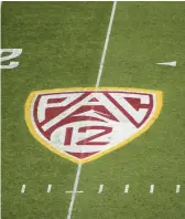  ?? AP ?? The Pac-12 logo is seen on the field during a game at Sun Devil Stadium on Nov. 9, 2019 in Tempe, Arizona.