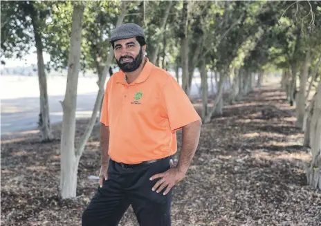  ??  ?? Gul Raziq is not simply a groundsman, he is also a keen golfer and plays off a handicap of 6 Victor Besa / The National