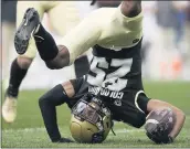  ?? DAVID ZALUBOWSKI – THE ASSOCIATED PRESS ?? Colorado’s Nikko Reed lands on his head after returning a punt during Saturday’s game against Texas A&M.