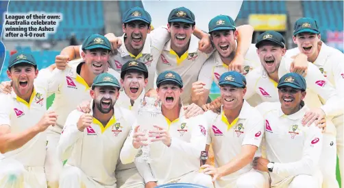  ??  ?? League of their own: Australia celebrate winning the Ashes after a 4-0 rout