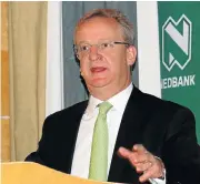  ?? /Freddy Mavunda ?? Pay back: Nedbank Group CEO Mike Brown at the bank’s interim results presentati­on at its head offices in Sandton.