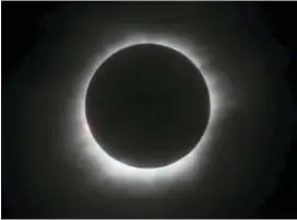  ?? FILE — THE ASSOCIATED PRESS ?? This photo shows a total solar eclipse in Belitung, Indonesia. A solar eclipse on Monday is set to star in several special broadcasts on TV and online. PBS, ABC, NBC, NASA Television and the Science Channel are among the outlets planning extended...