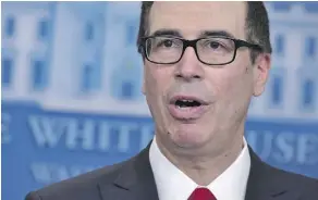  ?? MANDEL NGAN/AFP/GETTY IMAGES FILES ?? There are different views about the fate of the U.S.’s sterling rating if Treasury Secretary Steven Mnuchin turns to prioritizi­ng debt service over other obligation­s.