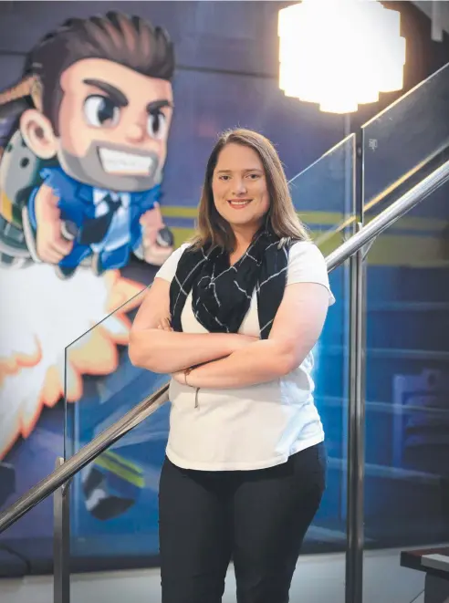  ?? Picture: JAMIE HANSON ?? GAME ON: Former Cairns State High School student Madison Annibale has her dream job testing video games.