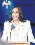  ?? ERIN SCHAFF THE NEW YORK TIMES ?? U.S. vice-president-elect Kamala Harris’s white pantsuit and white silk pussy-bow blouse were a silent yet bold recognitio­n of the progress made by the women who preceded her.