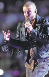  ?? KEVIN C. COX/ GETTY IMAGES ?? Justin Timberlake started off his Super Bowl LII halftime show in “Man of the Woods” apparel.